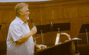 dr. shaw teaching church podium